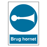 Påbudsskilt - Brug hornet